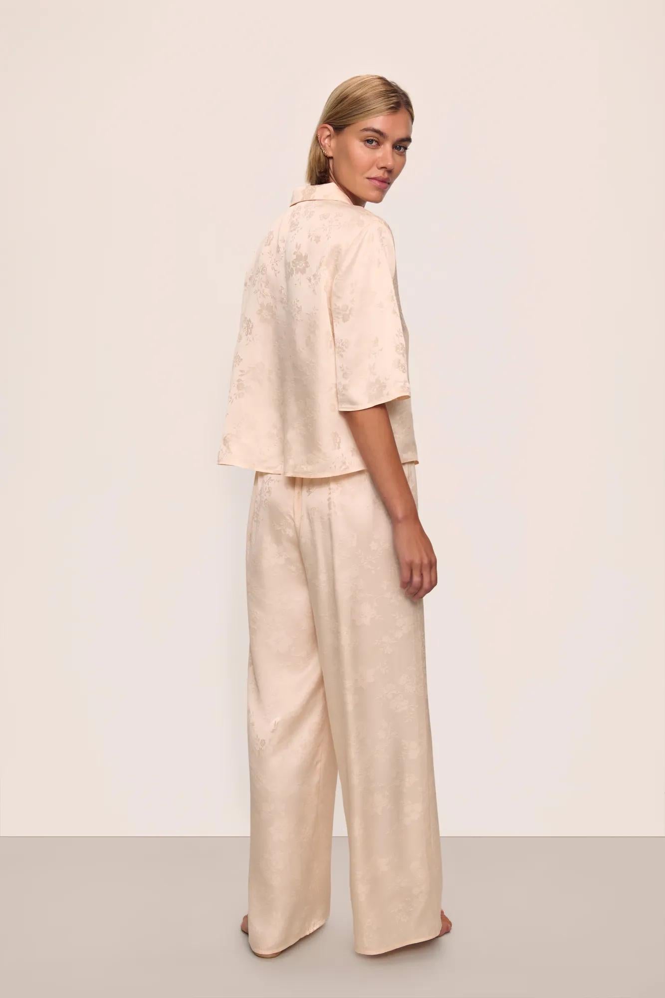 Model is wearing Inez Washable Silk Jacquard Relaxed Wide Leg Pant PJ Set in  Floral Vine Peach Dust