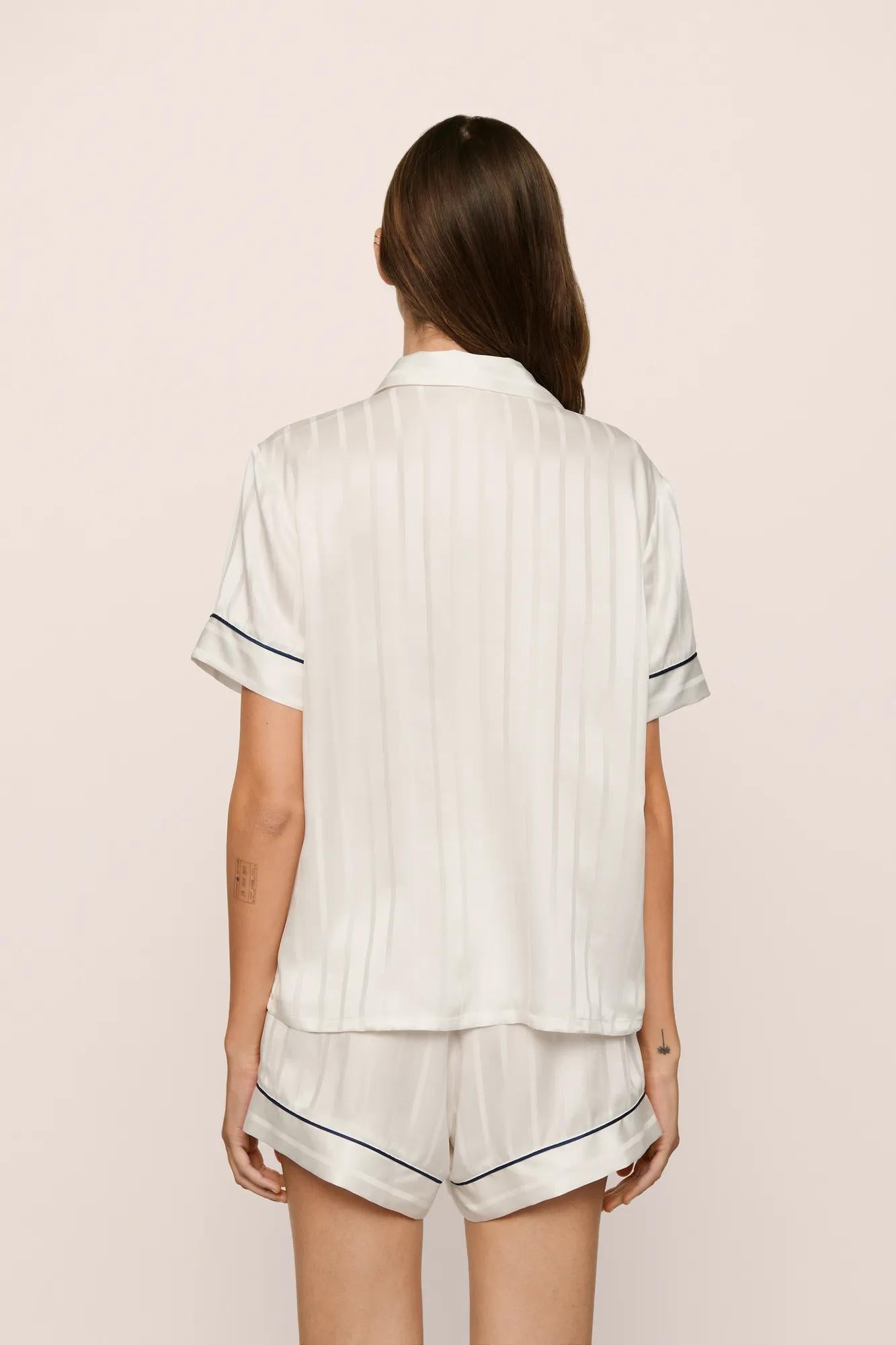 Model is wearing Inez Washable Silk Jacquard Short PJ Set in ClassicStripeJacquardPea/Na