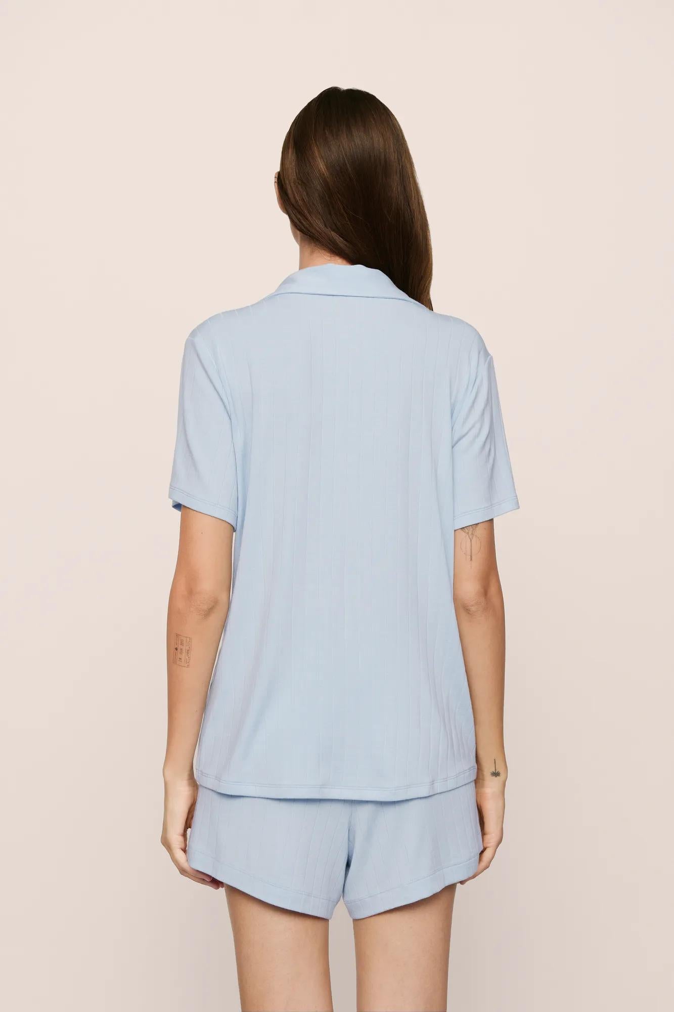 Model is wearing Gisele TENCEL™ Modal Rib Relaxed Short PJ Set in NantucketBreeze