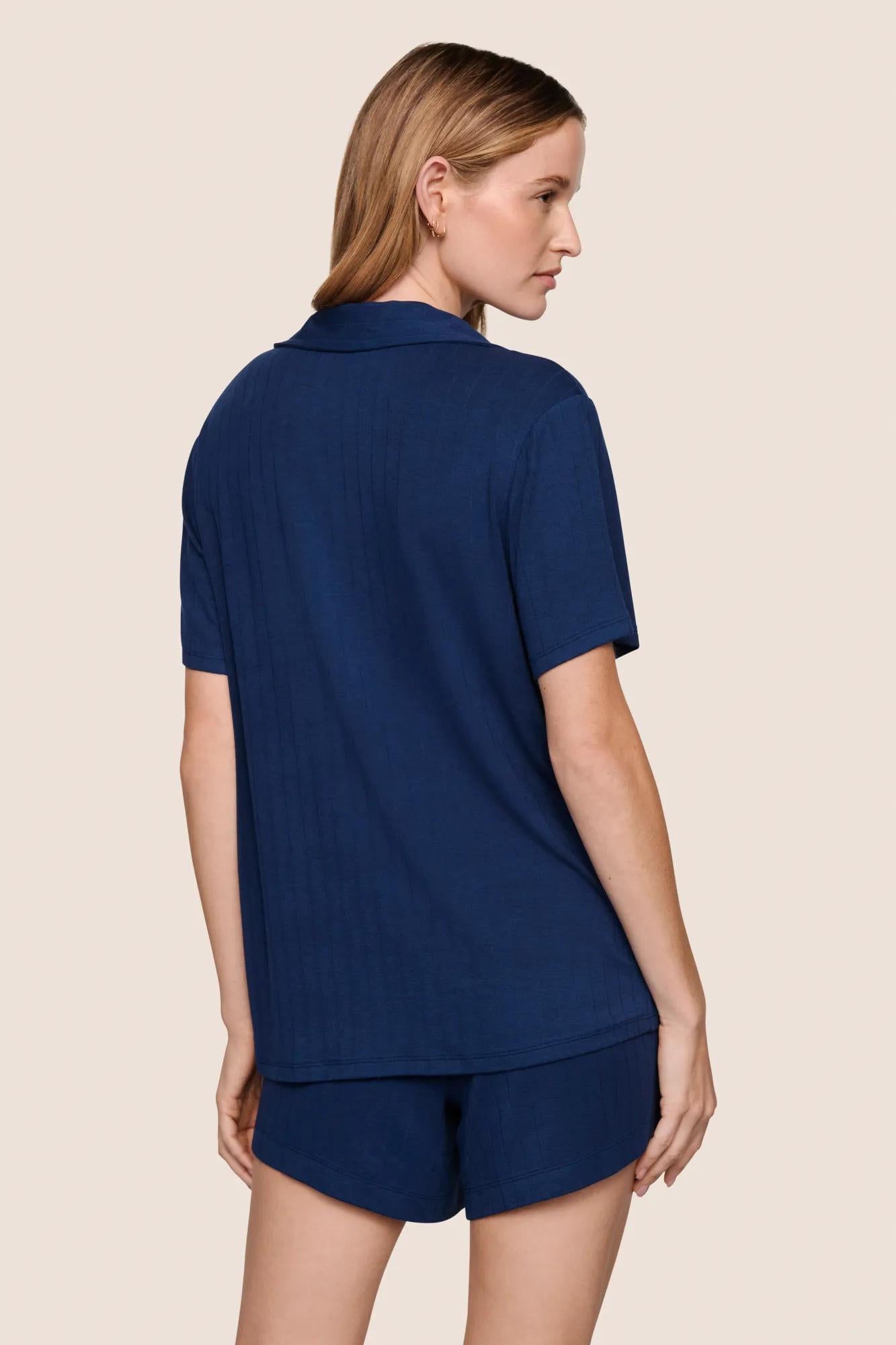 Model is wearing Gisele TENCEL™ Modal Rib Relaxed Short PJ Set  in Navy