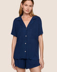 Model is wearing Gisele TENCEL™ Modal Rib Relaxed Short PJ Set  in Navy