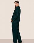 Model is wearing Flannel Long PJ Set  in Blk Watch Tartan Rainforest/Na