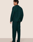 Model is wearing Men's Flannel Long PJ Set  in Blk Watch Tartan Rainforest/Na