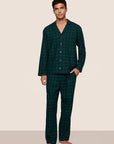 Model is wearing Men's Flannel Long PJ Set  in Blk Watch Tartan Rainforest/Na