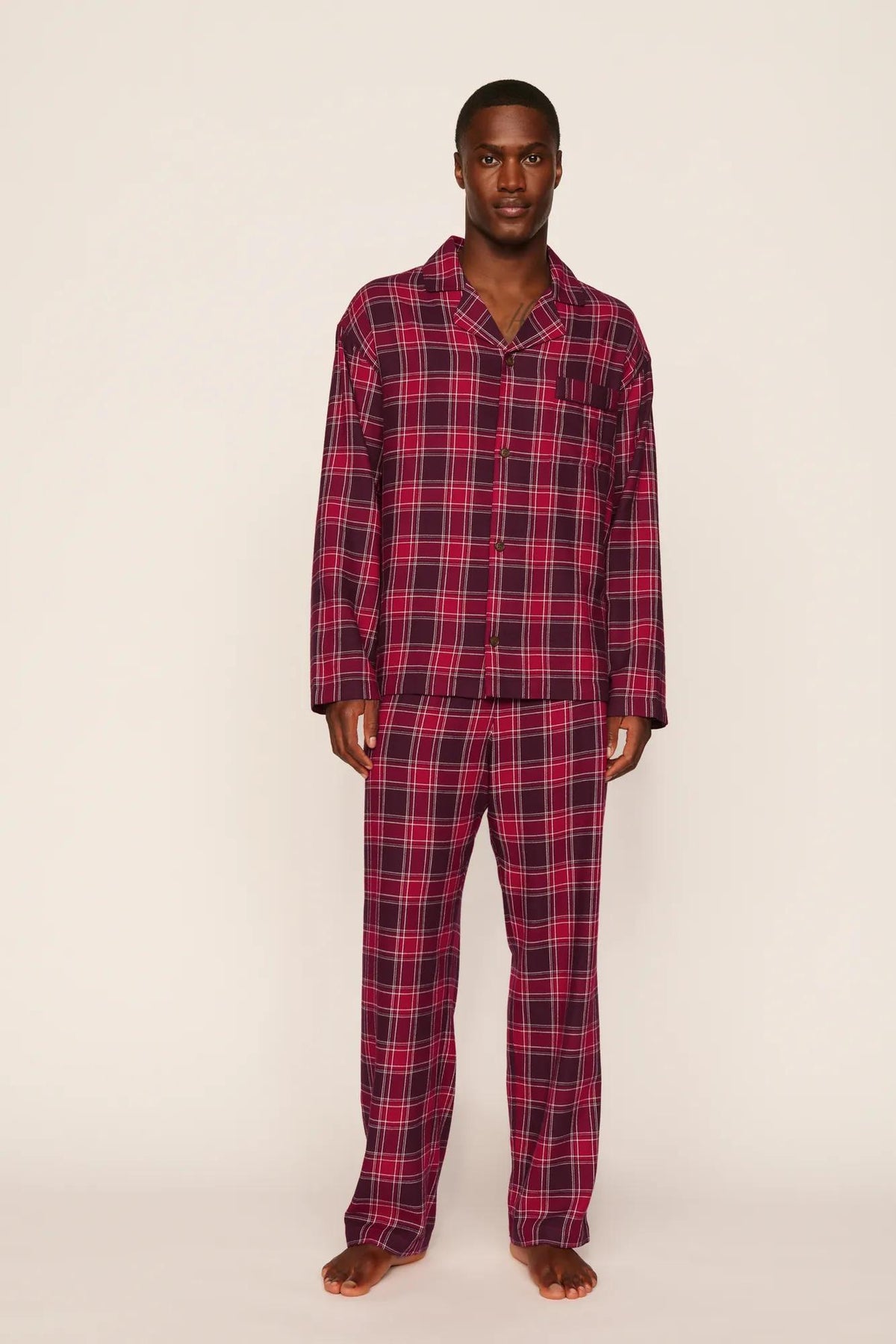 Model is wearing Flannel Men's Long PJ Set in Oxford Check Holly Red/Wildber