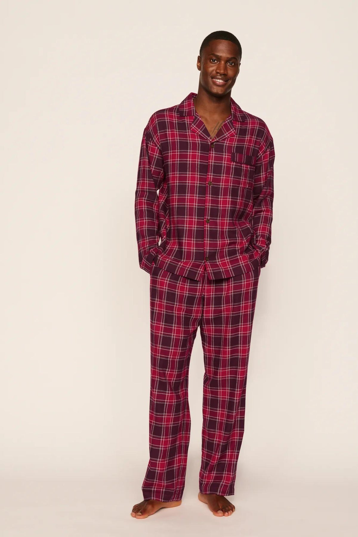 Model is wearing Flannel Men's Long PJ Set in Oxford Check Holly Red/Wildber