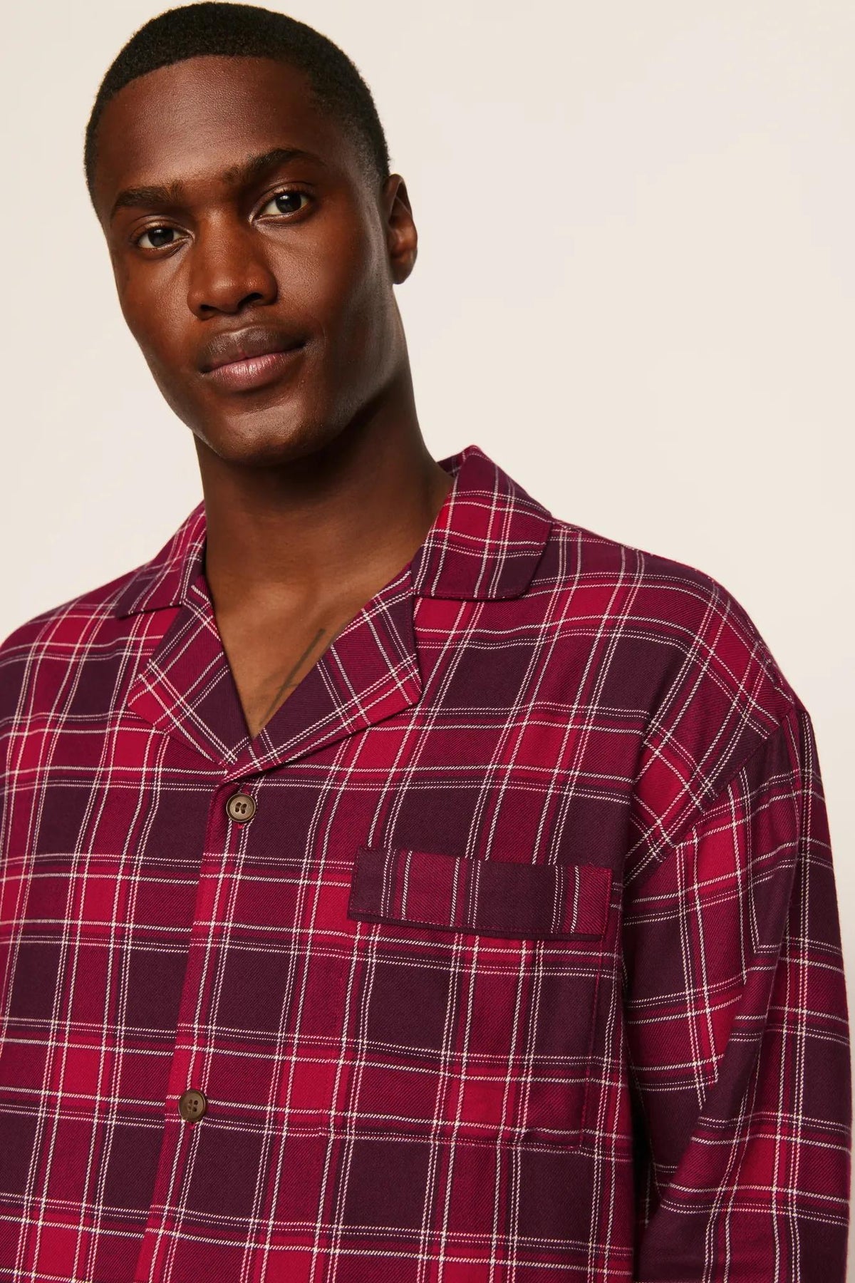 Model is wearing Flannel Men's Long PJ Set in Oxford Check Holly Red/Wildber