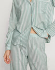 Model is wearing Nautico Long PJ Set in Regatta Stripe Seagrass/White