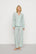 Model is wearing Nautico Long PJ Set in Regatta Stripe Seagrass/White
