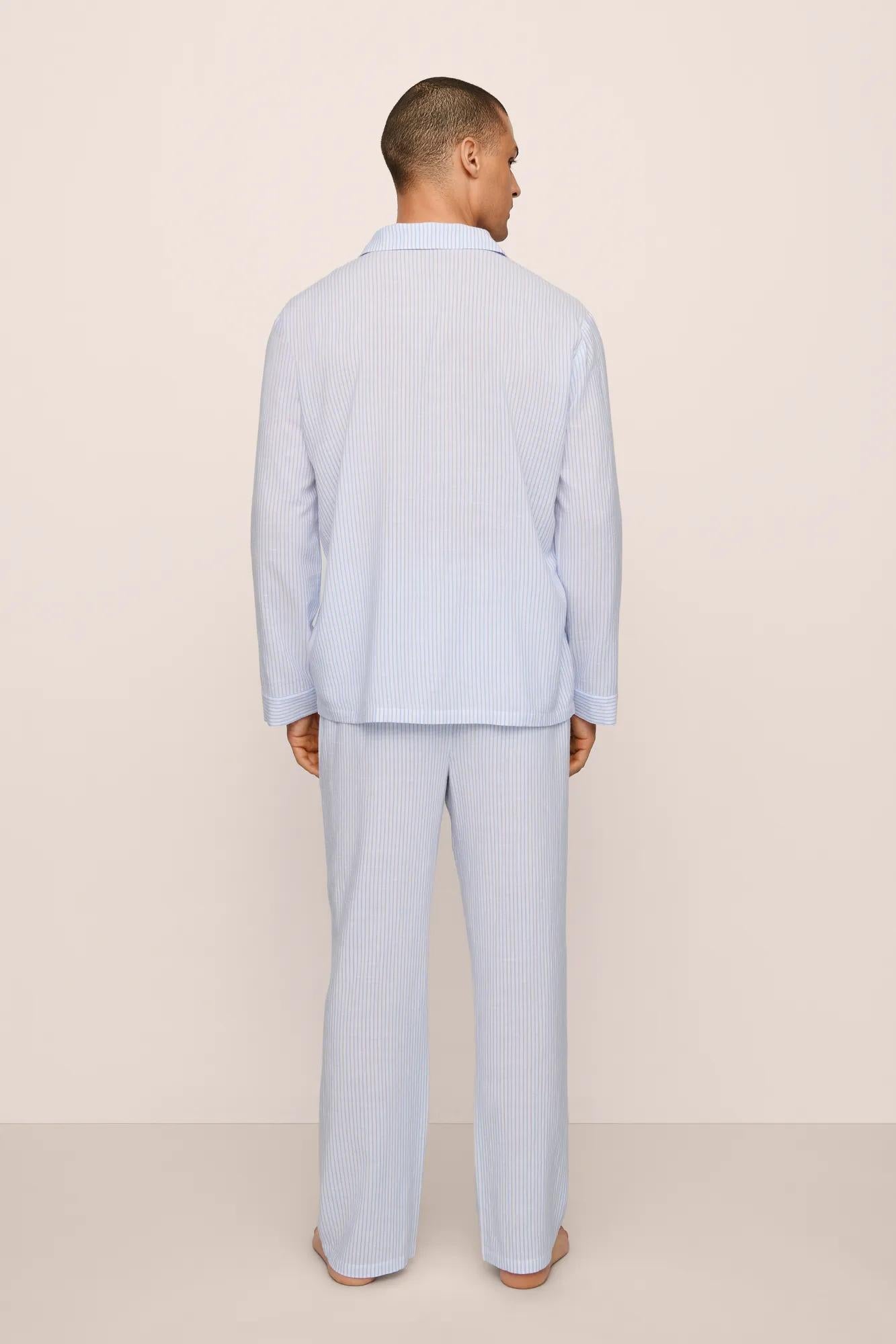 Model is wearing Men's Nautico Long PJ Set in White/CornflowerBlue