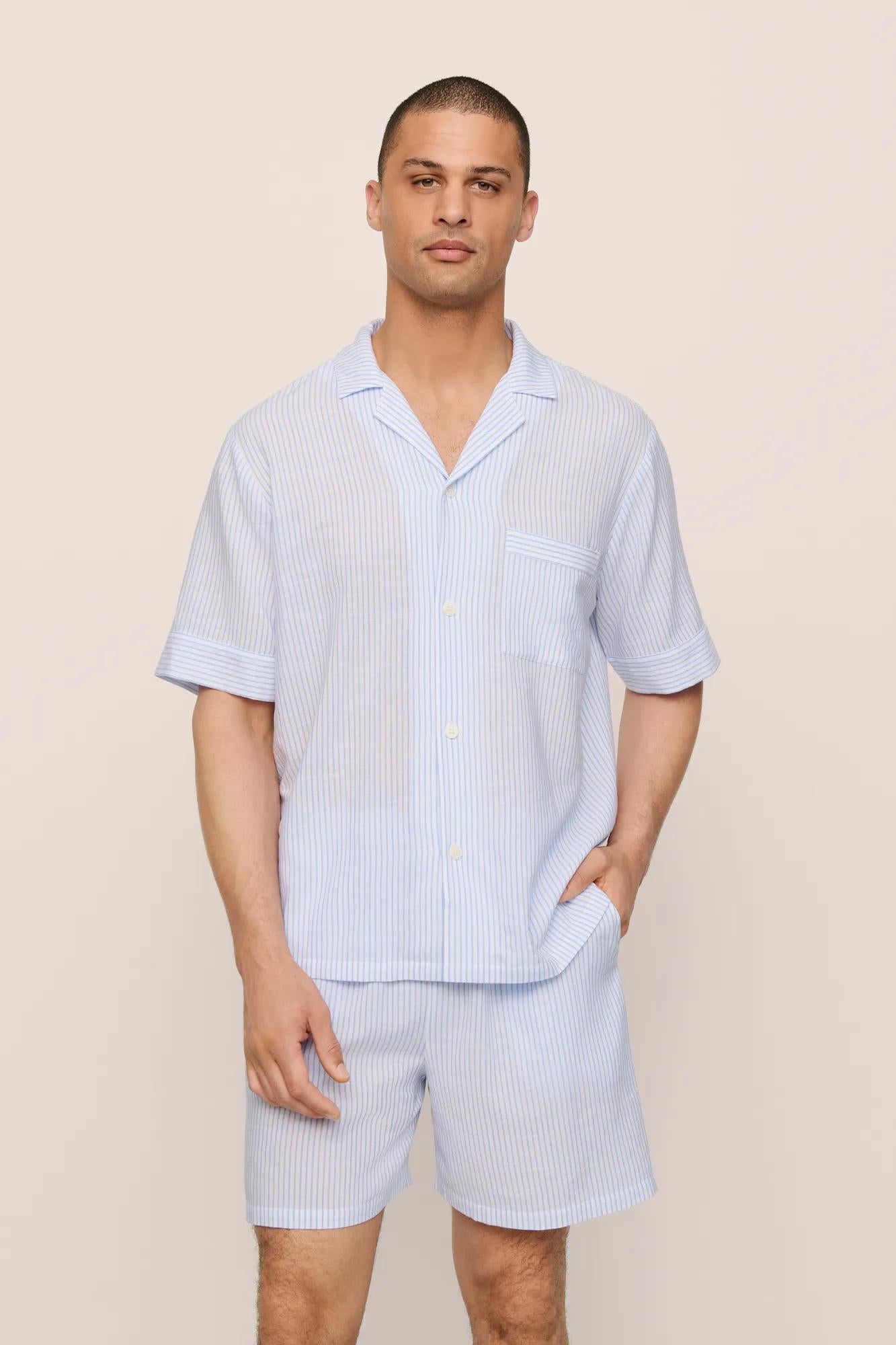 Model is wearing Men's Nautico Short PJ Set in White/CornflowerBlue