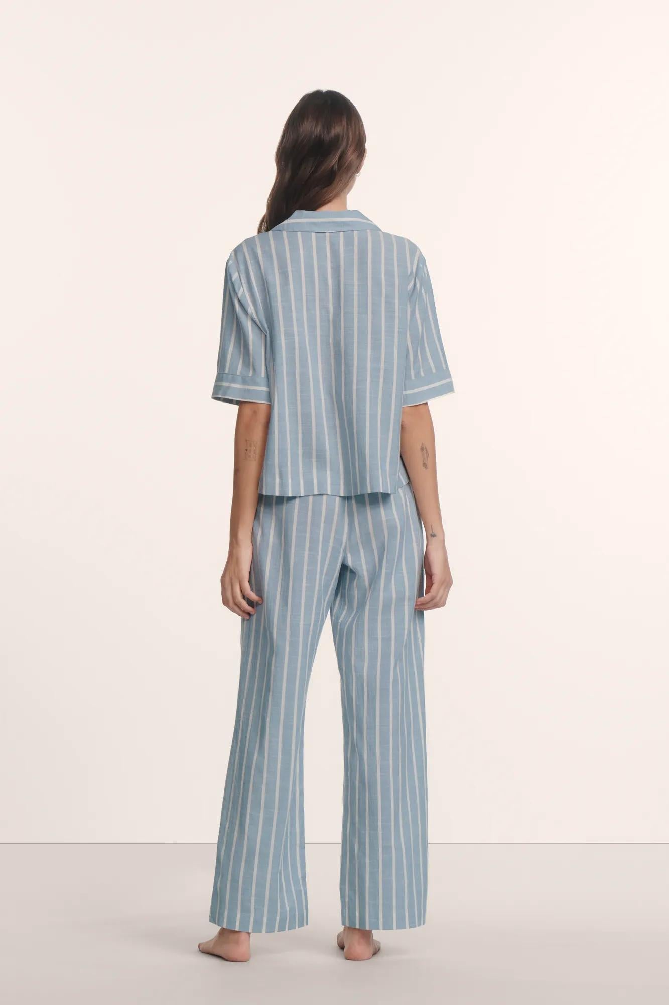 Model is wearing Nautico Relaxed Short Sleeve & Pant PJ Set in Classic Stripe Slate Blue/Ivor