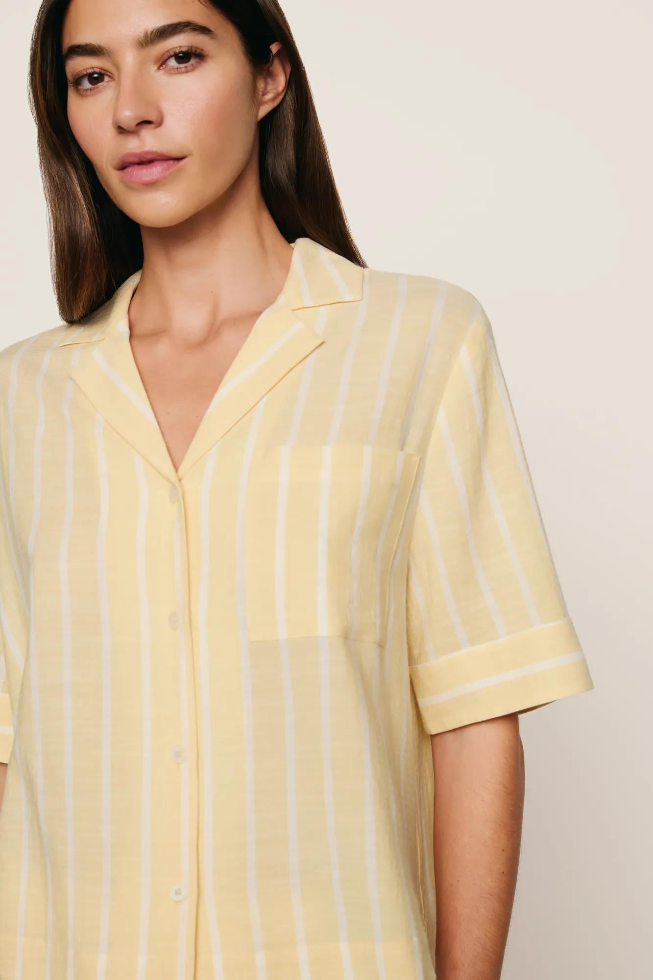 Model is wearing Nautico Relaxed Short Sleeve & Pant PJ Set in Classic Stripe Sunbeam/Ivory