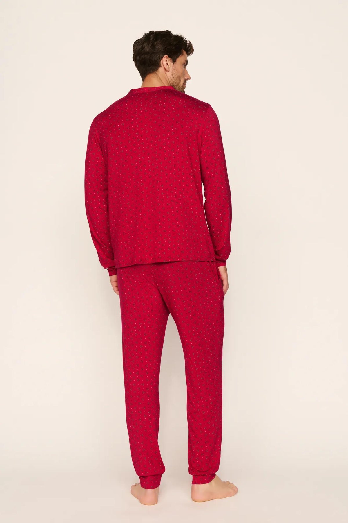 Model is wearing Henry Printed TENCEL™ Modal Long PJ Set in Hollyberry Holly Red
