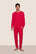 Model is wearing Henry Printed TENCEL™ Modal Long PJ Set  in Nutcracker Holly Red