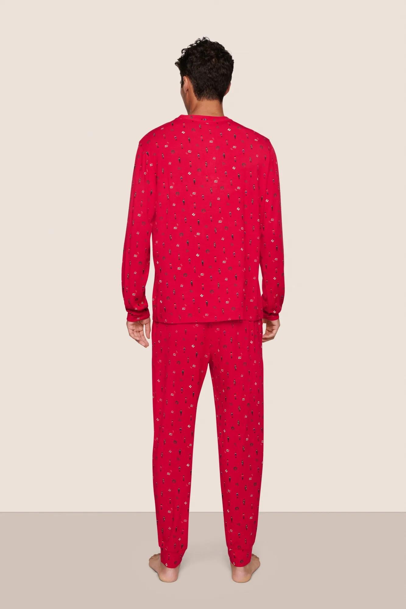 Model is wearing Henry Printed TENCEL™ Modal Long PJ Set  in Nutcracker Holly Red