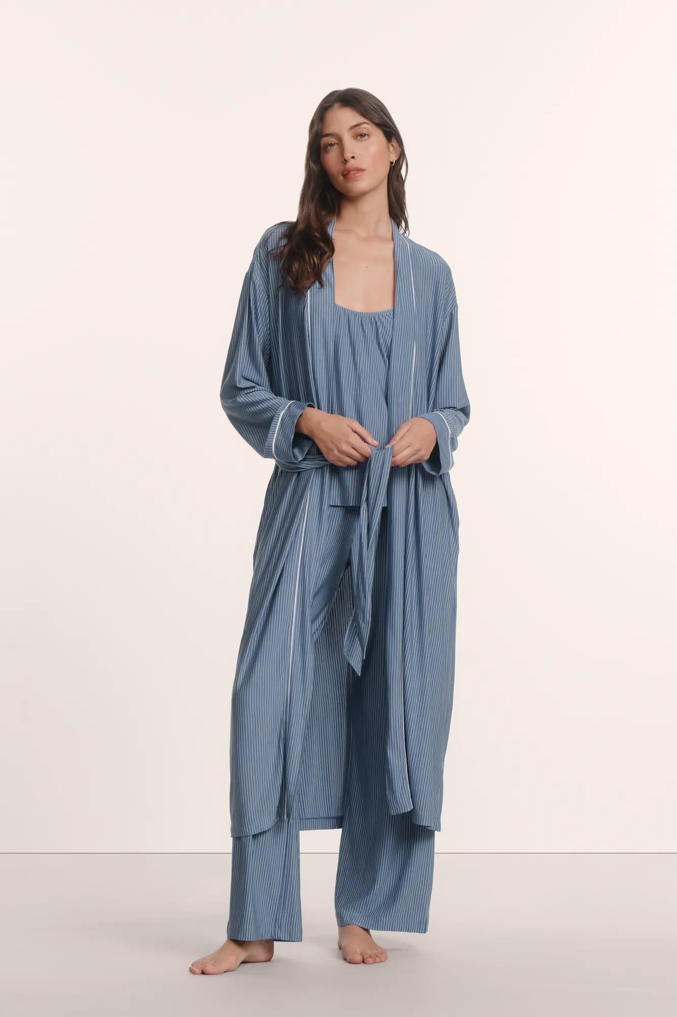 Model is wearing Gisele Printed TENCEL™ Modal Long Robe in Duo Stripe Slate Blue/Ivory