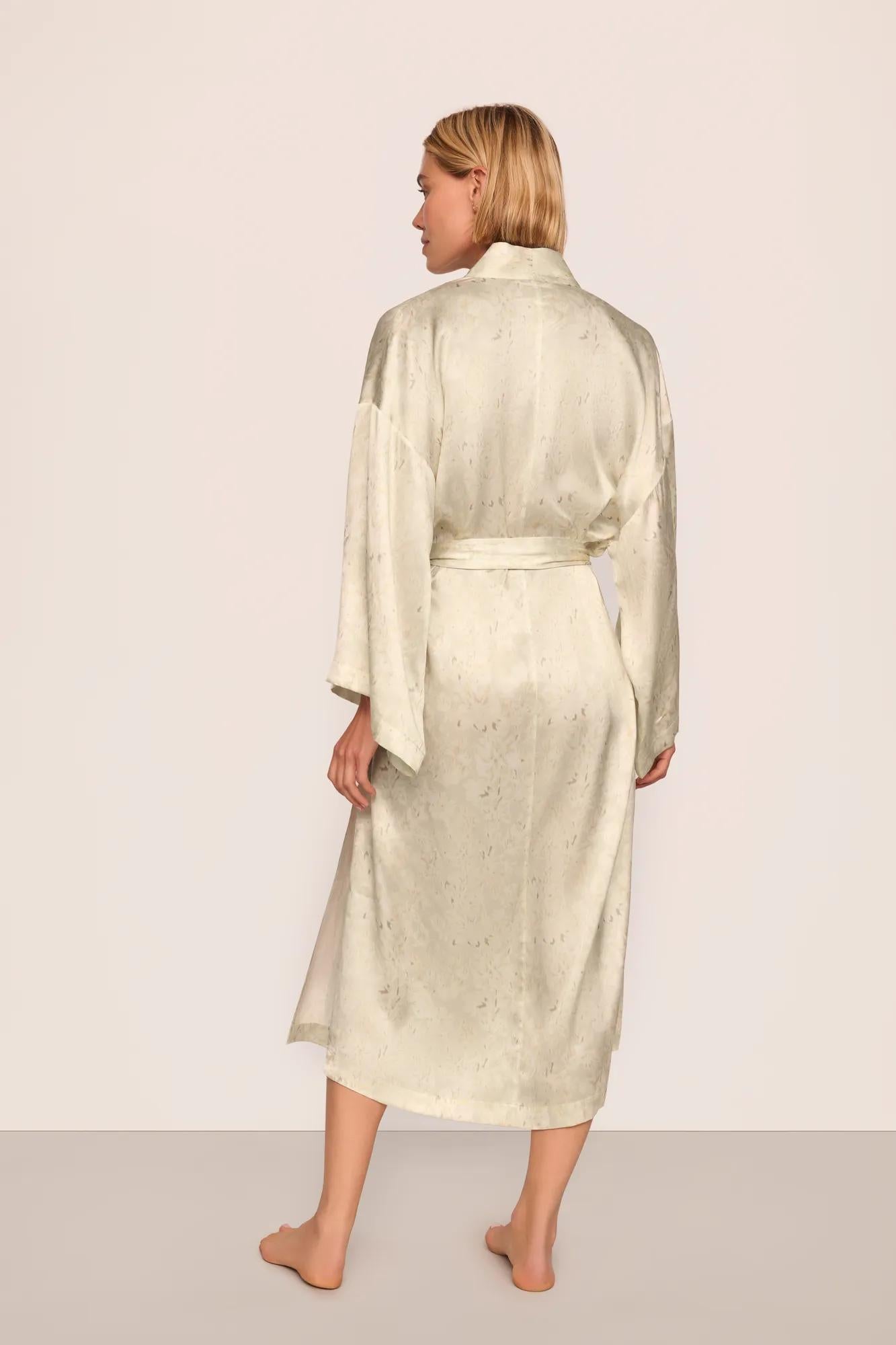 Model is wearing Inez Washable Silk Printed Robe in Foliage Mint Cream