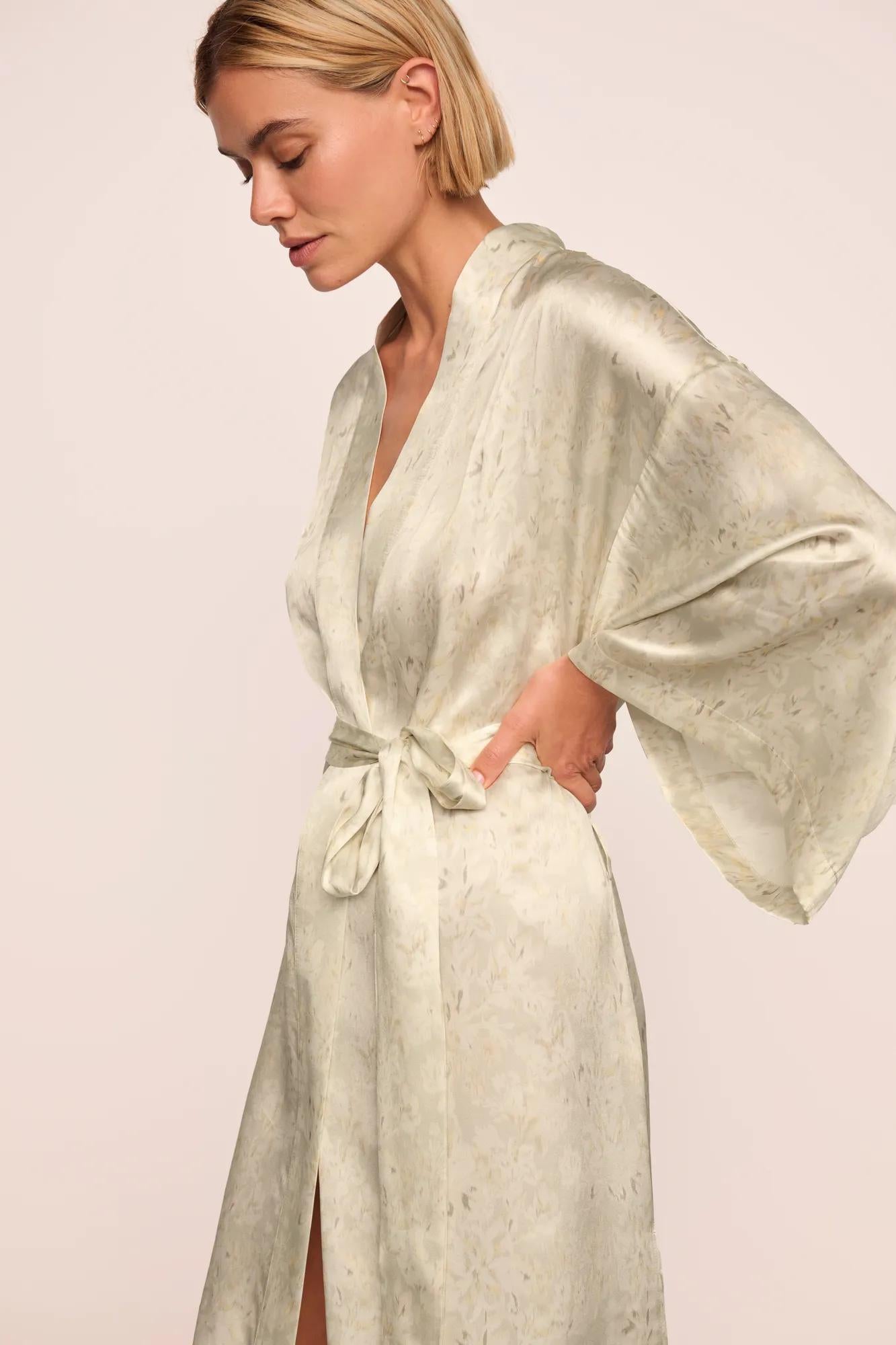 Model is wearing Inez Washable Silk Printed Robe in Foliage Mint Cream