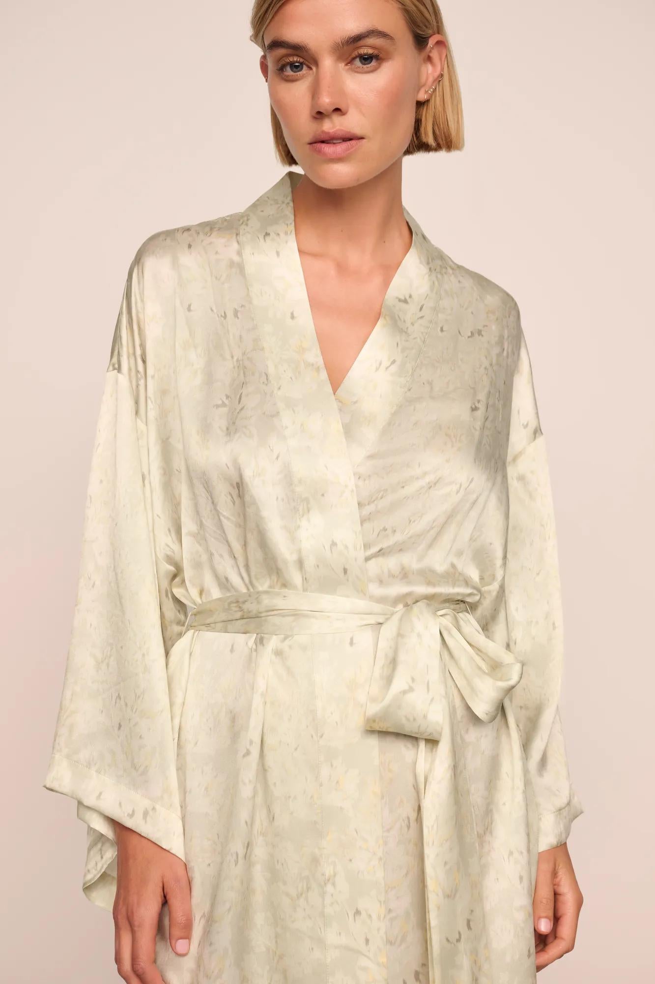 Model is wearing Inez Washable Silk Printed Robe in Foliage Mint Cream