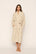Model is wearing Recycled Boucle Robe in French Oak