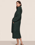 Model is wearing Recycled Boucle Robe  in Pine