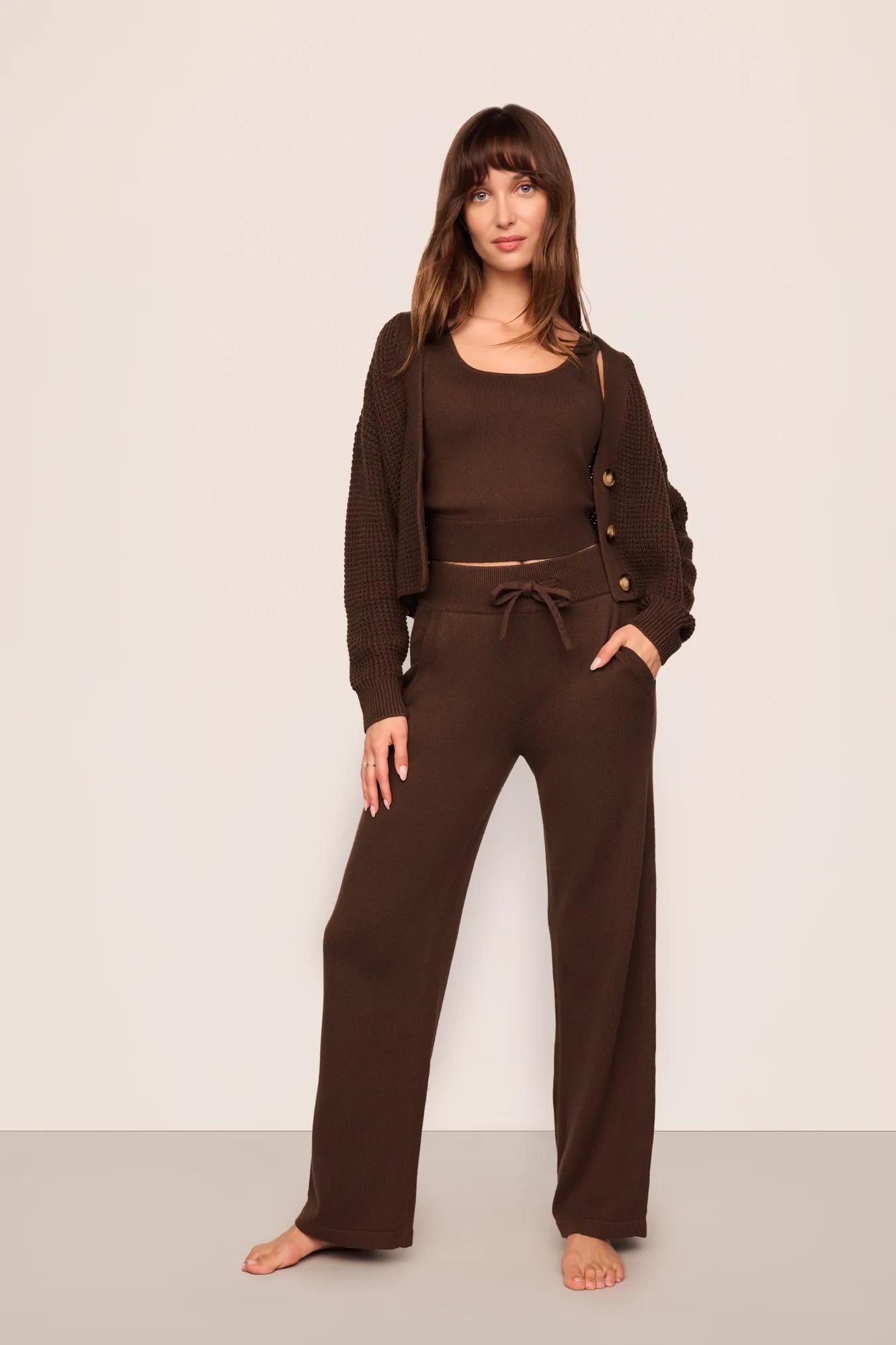 Model is wearing Recycled Sweater Pant  in  Chocolate