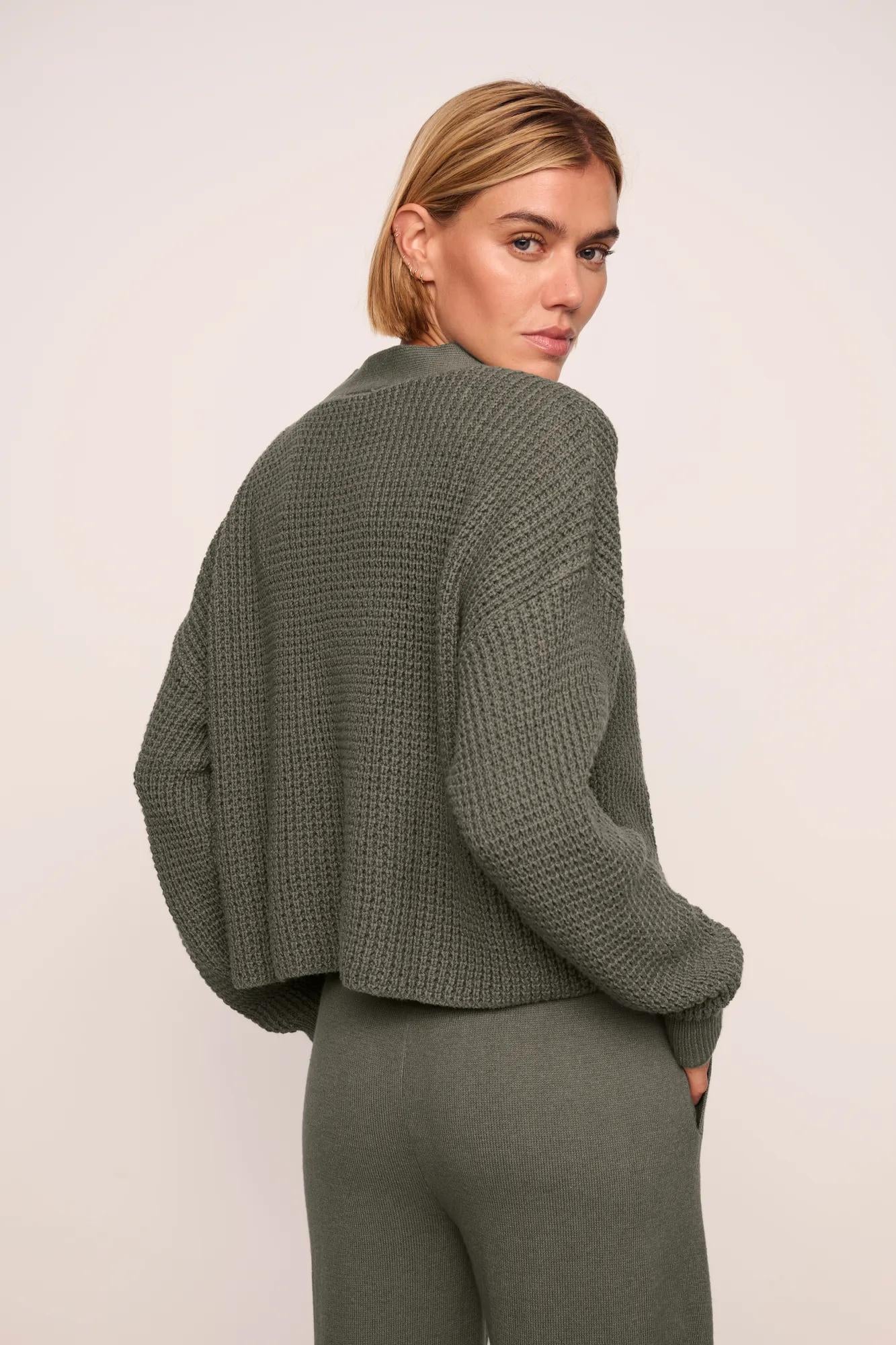 Model is wearing Recycled Sweater Cropped Cardigan  in Smokey Olive