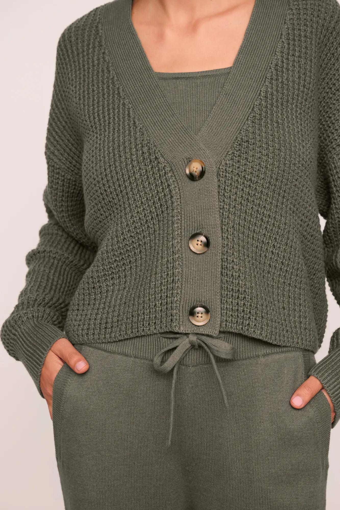 Model is wearing Recycled Sweater Cropped Cardigan  in Smokey Olive