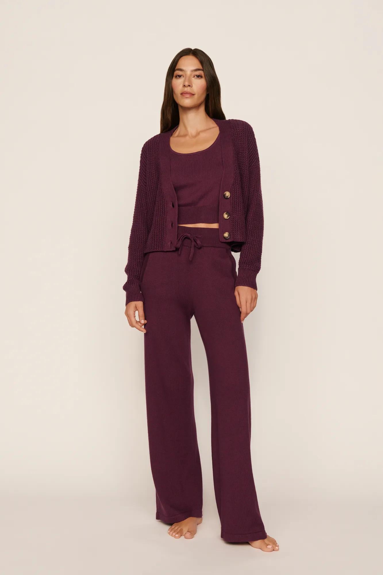 Model is wearing Recycled Sweater Pant in Wildberry
