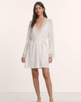 Model is wearing Lara TENCEL™ Modal Short Robe in Ivory