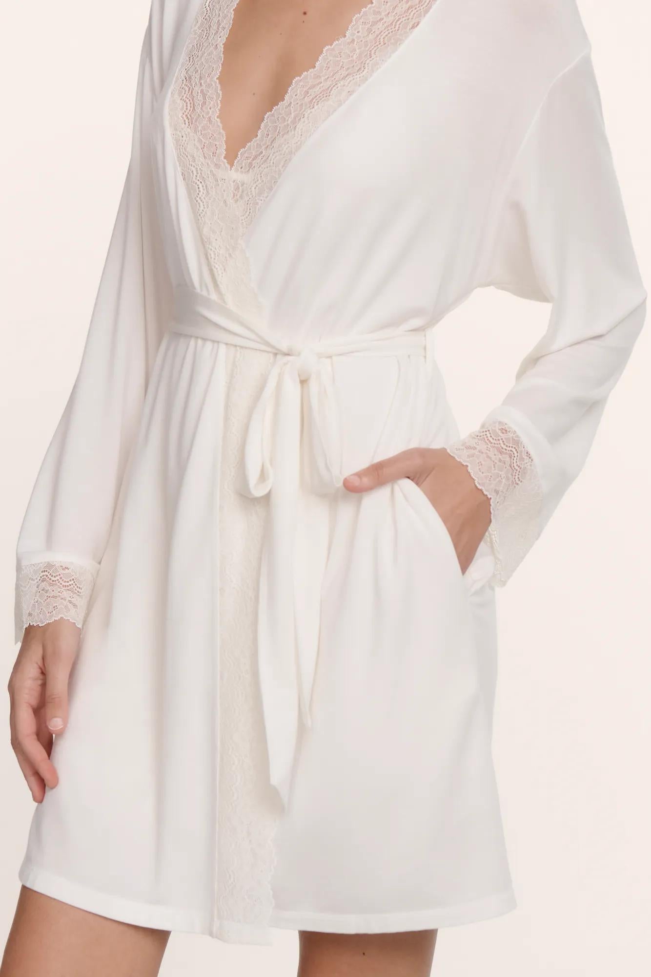 Model is wearing Lara TENCEL™ Modal Short Robe in Ivory