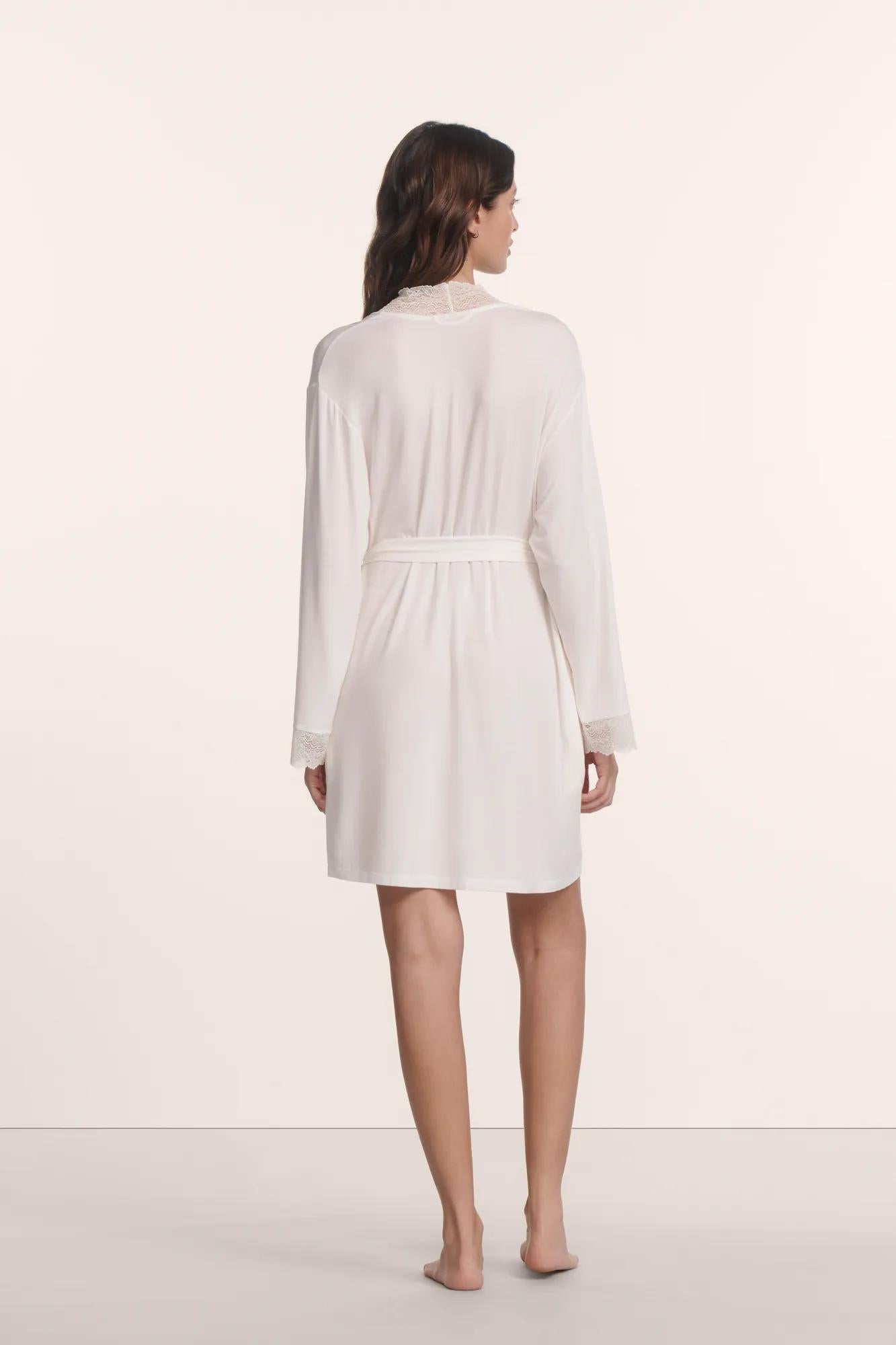 Model is wearing Lara TENCEL™ Modal Short Robe in Ivory