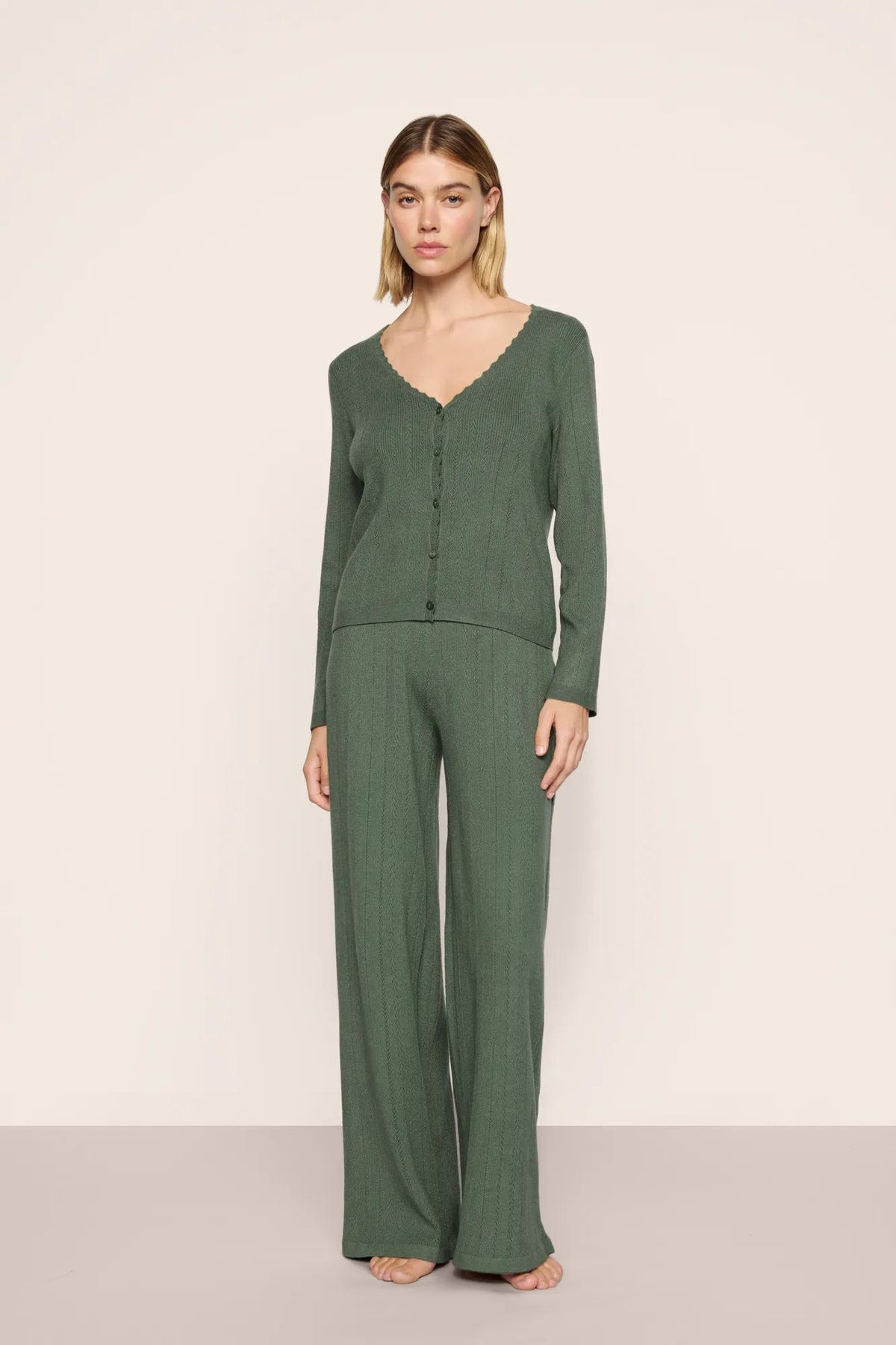 Model wearing the Pointelle Sweater Cardigan and Straight Leg Pant in Desert Sage
