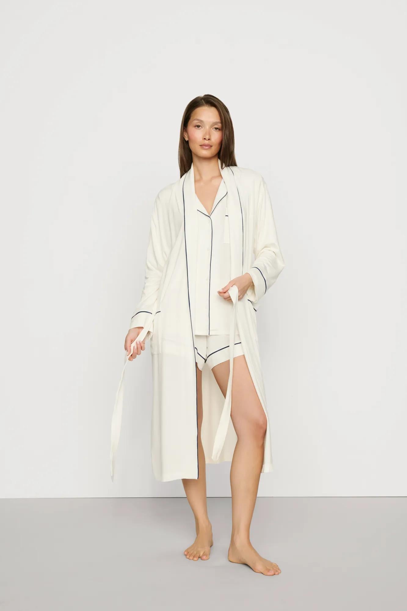 Model is wearing Gisele TENCEL™ Modal Long Robe in Ivory/Navy