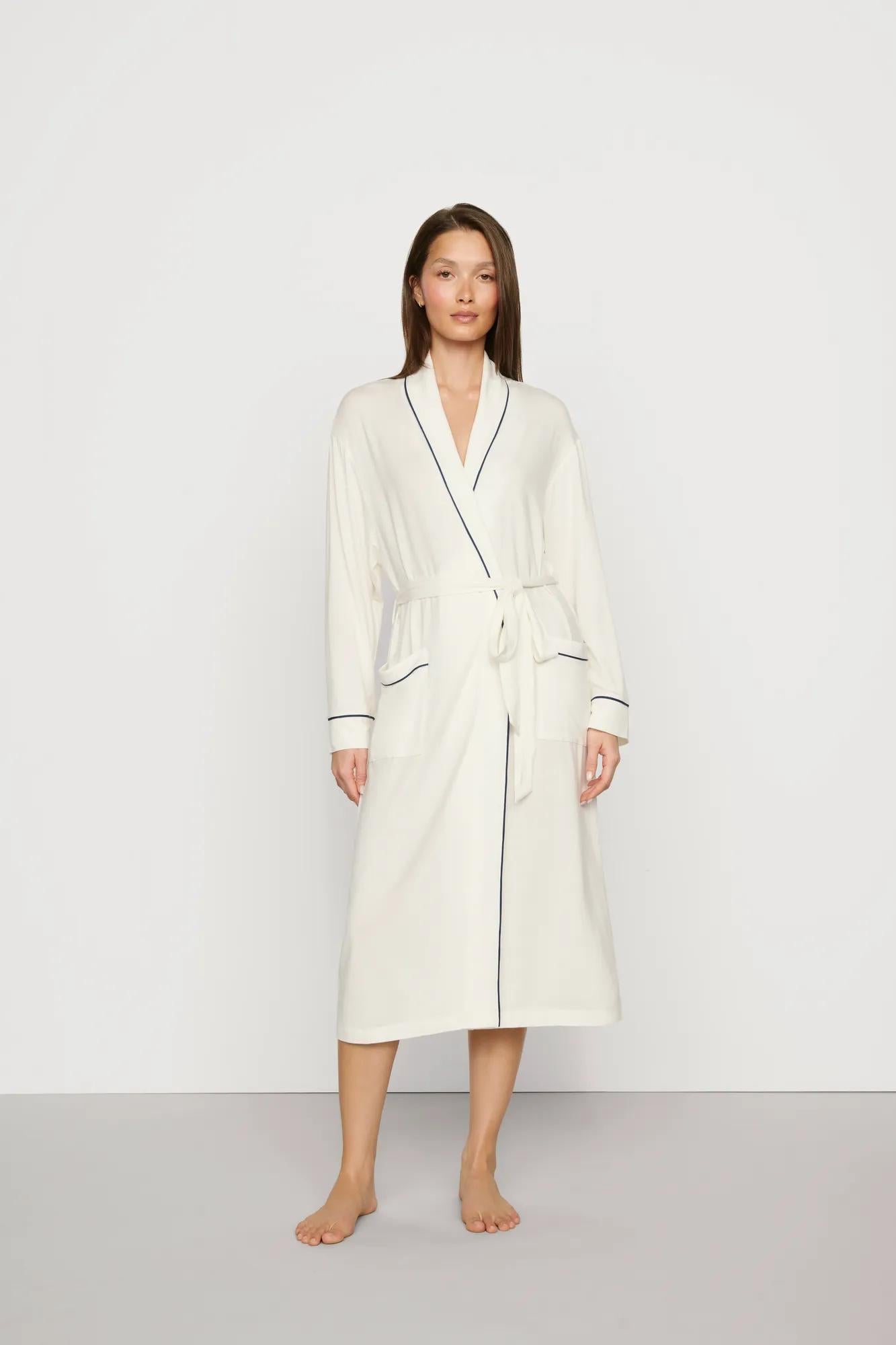 Model is wearing Gisele TENCEL™ Modal Long Robe in Ivory/Navy