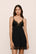 Model is wearing Beatrix TENCEL™ Modal Slip in Black