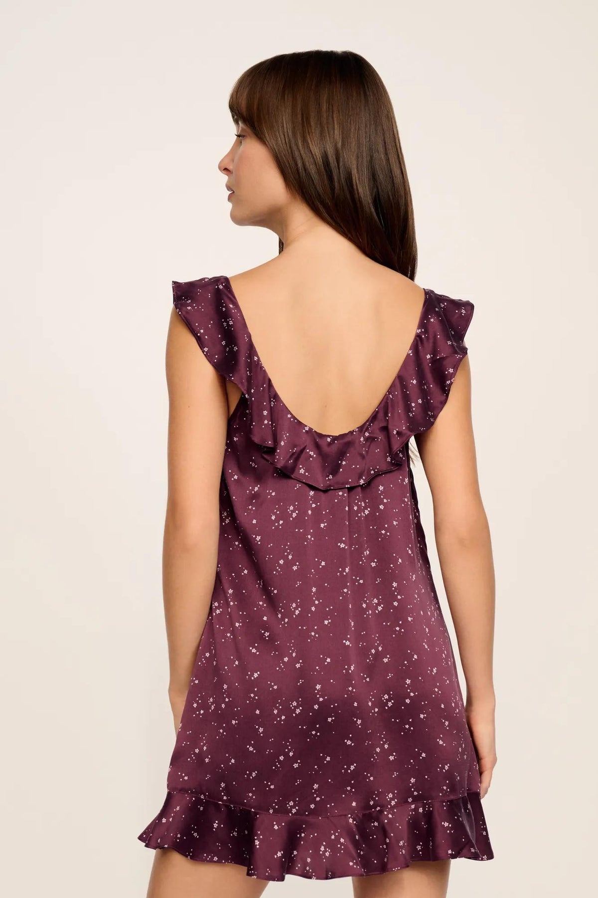 Model is wearing Washable Silk Printed Ruffle Babydoll in Starlight Wildberry