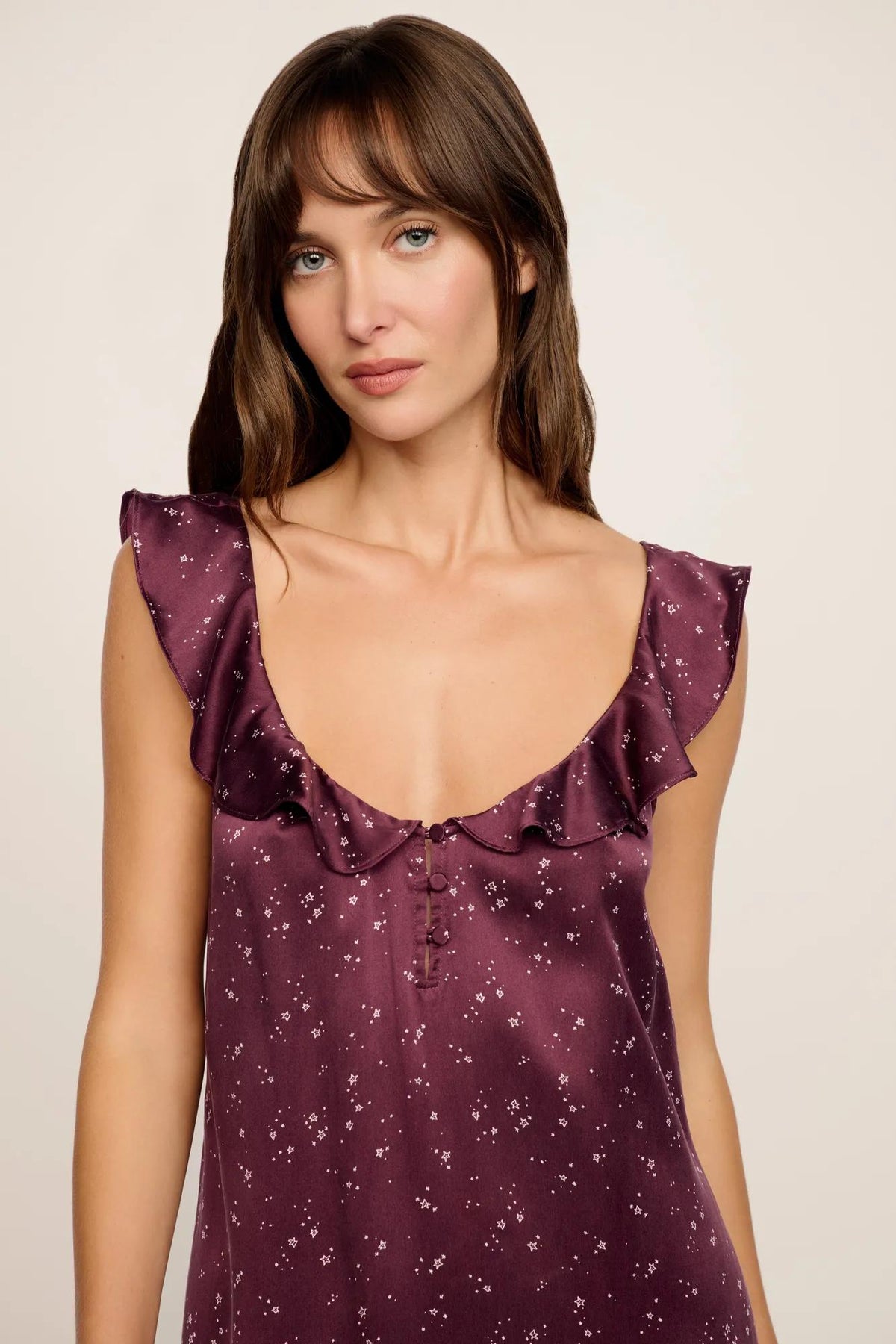 Model is wearing Washable Silk Printed Ruffle Babydoll in Starlight Wildberry