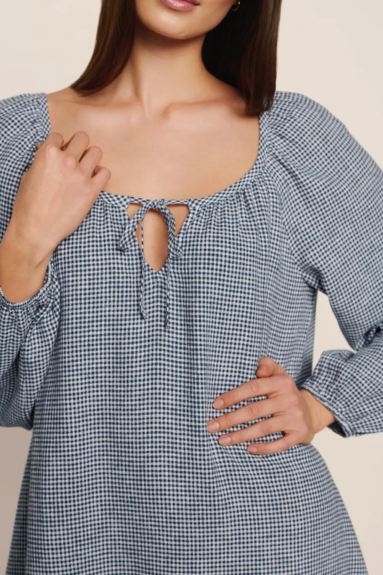 Model is wearing Linen Blend Short Dress in Gingham White/Navy