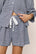 Model is wearing Linen Blend Relaxed Short in GinghamWhite/Navy