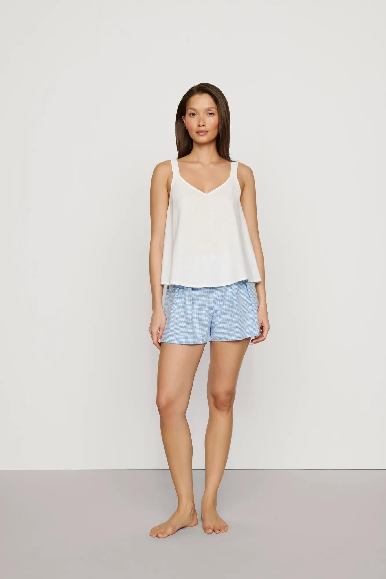 Model is wearing Linen Blend Relaxed Short in Gingham White/Summer Blue