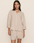 Model is wearing Linen Blend Relaxed Short in Gingham White/Warm Taupe