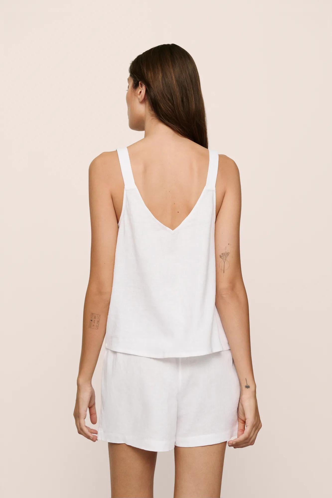 Model is wearing Linen Blend Relaxed Short in White