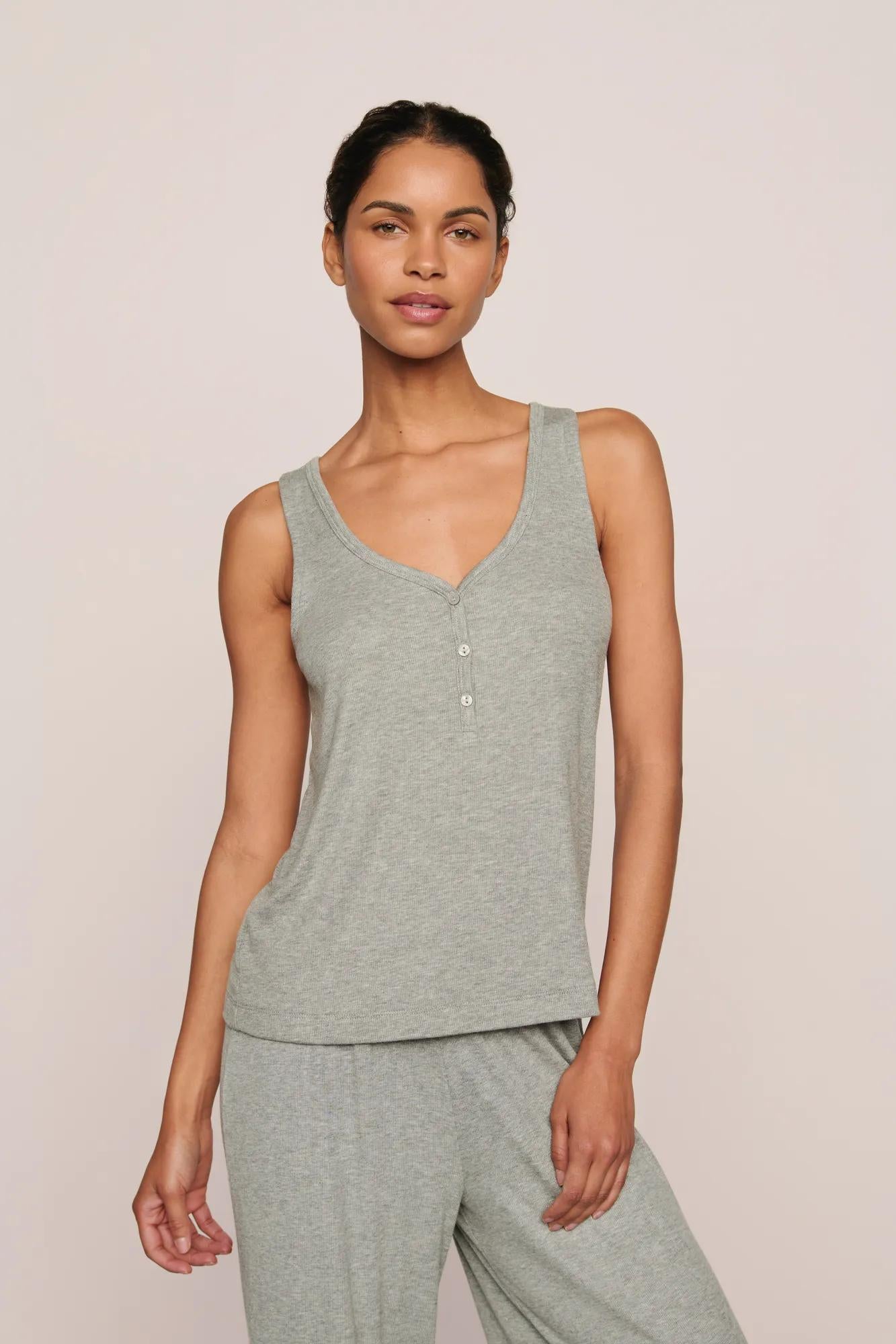 Model is wearing Dream Rib V Neck Tank in Dark Heather Grey