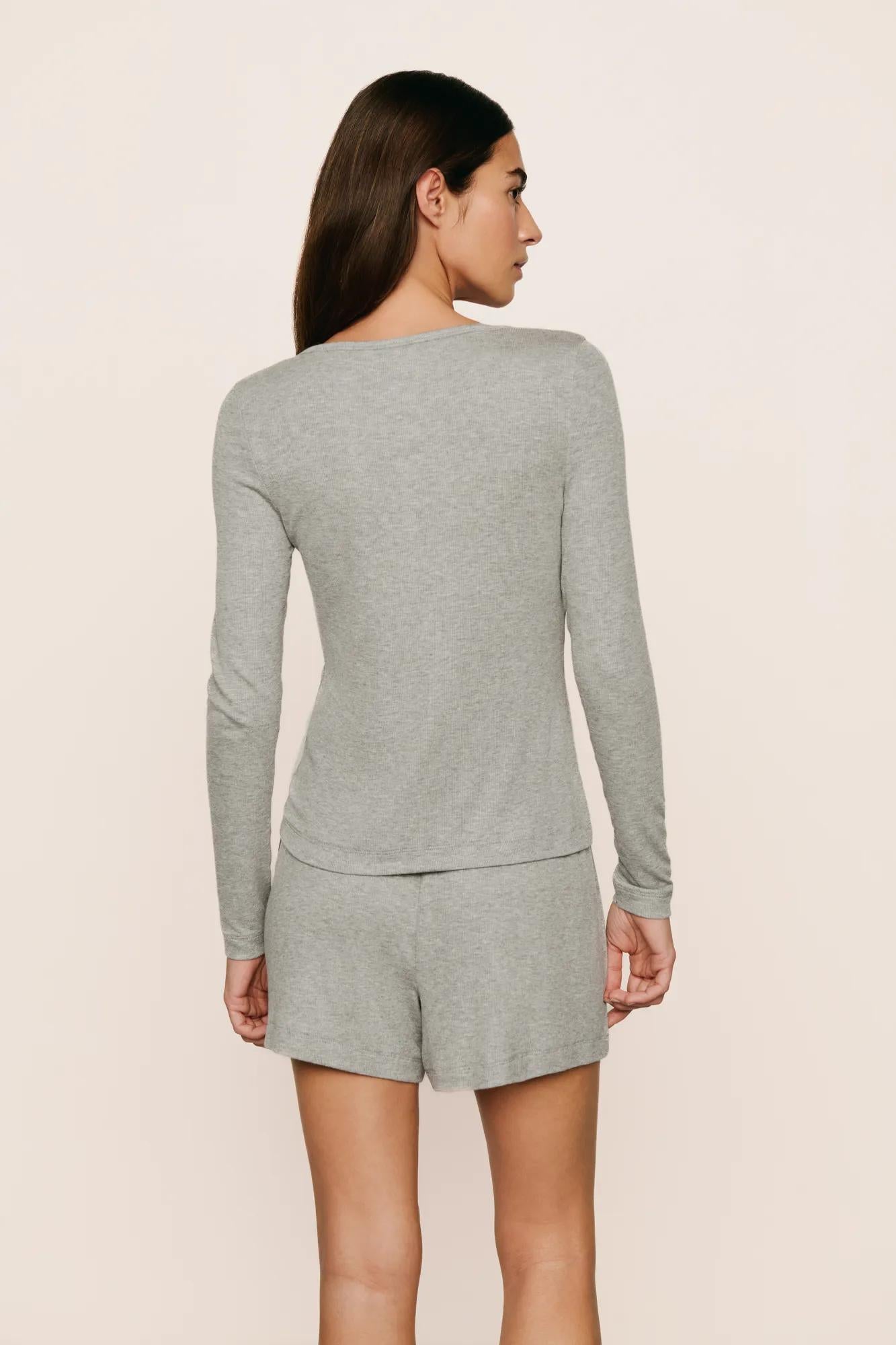 Model is wearing Dream Rib Long Sleeve Henley Tee in Dark Heather Grey