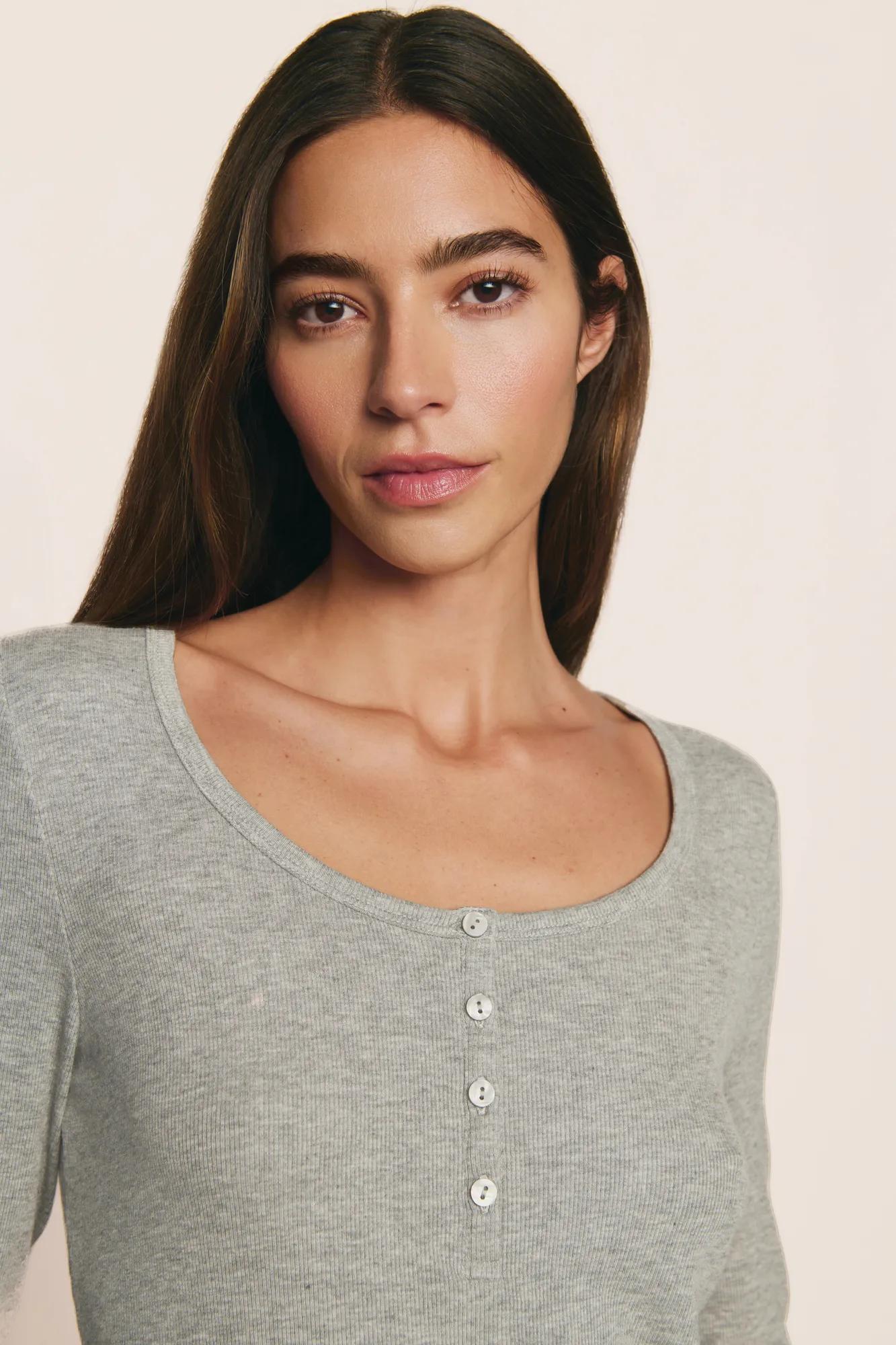 Model is wearing Dream Rib Long Sleeve Henley Tee in Dark Heather Grey