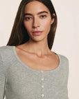 Model is wearing Dream Rib Long Sleeve Henley Tee in Dark Heather Grey