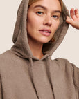 Model is wearing Recycled Boucle Hoodie  in Deep Taupe