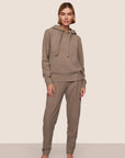 Model is wearing Recycled Boucle Hoodie  in Deep Taupe